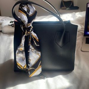 small black tote bag